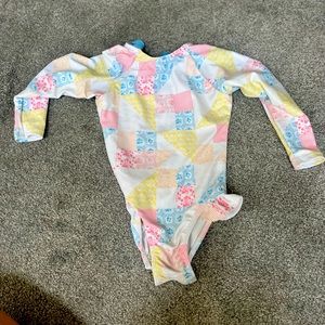 Minnow size 2T long sleeve swimsuit.